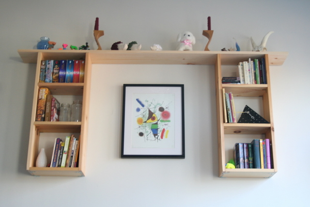 finished wooden wall-hung bookshelf